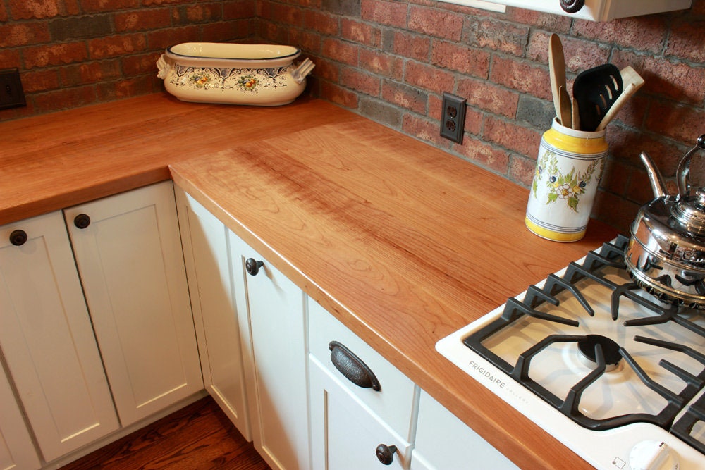 Custom Cherry Wood Plank Countertop - 79 dollars a square foot.  Made to your specifications. Contact us for a quote!
