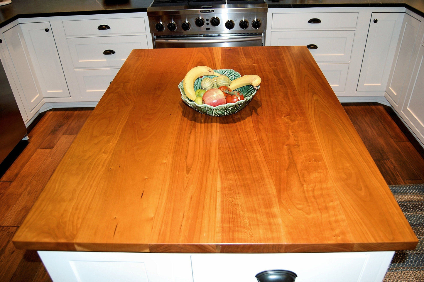Custom Cherry Wood Plank Countertop - 79 dollars a square foot.  Made to your specifications. Contact us for a quote!